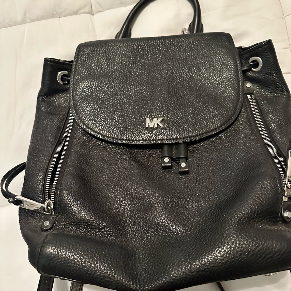 Michael Kors Black Leather backpack purse.